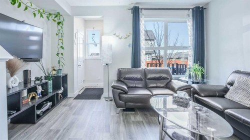 100 Carringvue Way Nw, Calgary, AB - Indoor Photo Showing Living Room