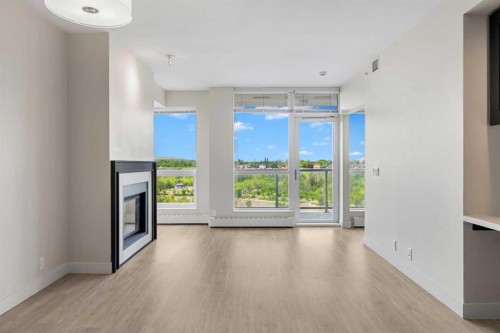 1712-222 Riverfront Avenue Sw, Calgary, AB - Indoor With Fireplace