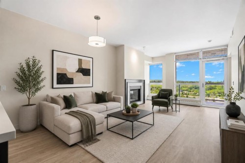1712-222 Riverfront Avenue Sw, Calgary, AB - Indoor Photo Showing Living Room With Fireplace