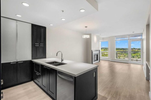 1712-222 Riverfront Avenue Sw, Calgary, AB - Indoor Photo Showing Kitchen With Double Sink