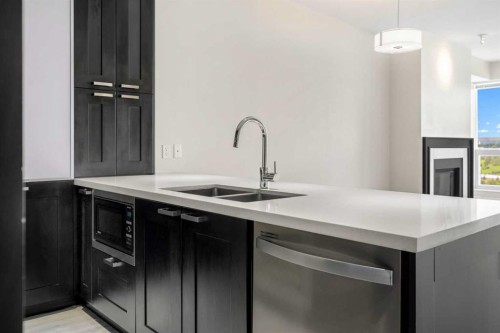 1712-222 Riverfront Avenue Sw, Calgary, AB - Indoor Photo Showing Kitchen With Double Sink