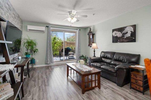114-30 Cranfield Link Se, Calgary, AB - Indoor Photo Showing Living Room