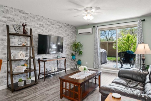 114-30 Cranfield Link Se, Calgary, AB - Indoor Photo Showing Living Room