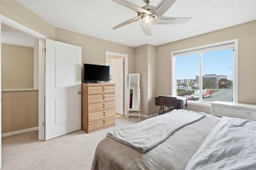 383 Fireside Place, Cochrane, AB - Indoor Photo Showing Bedroom