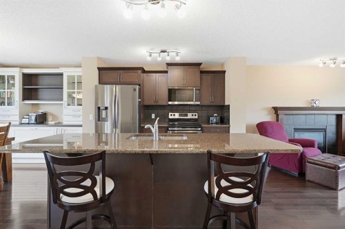 383 Fireside Place, Cochrane, AB - Indoor Photo Showing Kitchen With Stainless Steel Kitchen With Upgraded Kitchen
