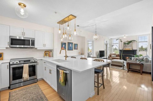 301-2121 98 Avenue Sw, Calgary, AB - Indoor Photo Showing Kitchen With Upgraded Kitchen