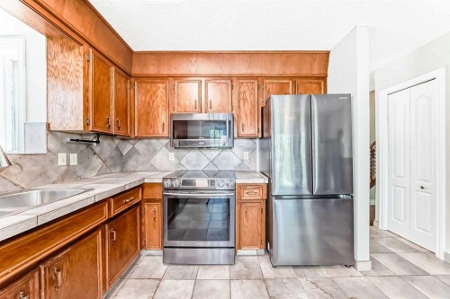 55 Woodstock Way Sw, Calgary, AB 
