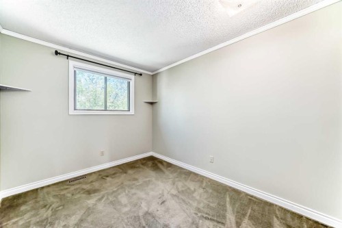 55 Woodstock Way Sw, Calgary, AB 