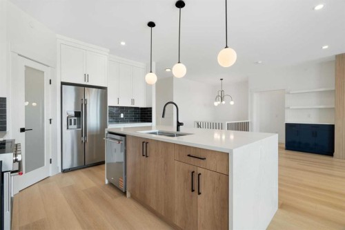 150 Muirfield Boulevard, Lyalta, AB - Indoor Photo Showing Kitchen With Double Sink With Upgraded Kitchen