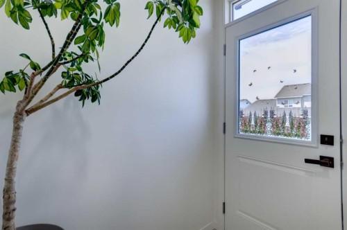 30 Creekside Manor Sw, Calgary, AB - Indoor Photo Showing Other Room