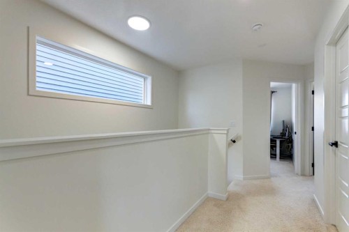 30 Creekside Manor Sw, Calgary, AB - Indoor Photo Showing Other Room