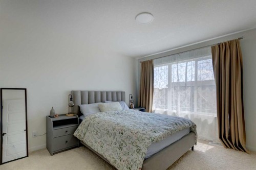 30 Creekside Manor Sw, Calgary, AB - Indoor Photo Showing Bedroom