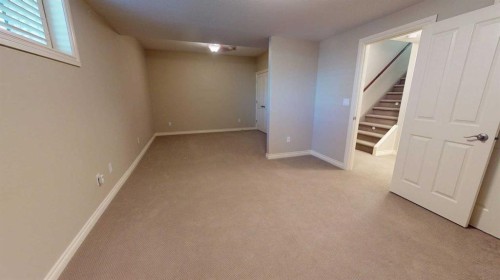 4-7001 52 Street, Lacombe, AB - Indoor Photo Showing Other Room