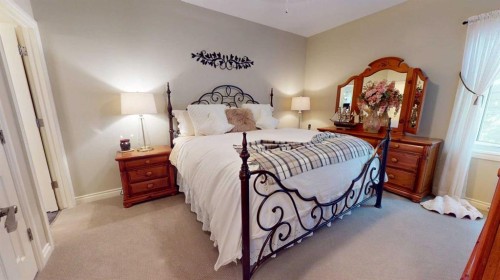 4-7001 52 Street, Lacombe, AB - Indoor Photo Showing Bedroom