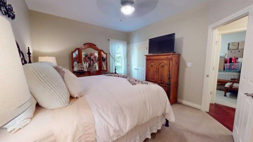 4-7001 52 Street, Lacombe, AB - Indoor Photo Showing Bedroom