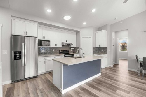 289 Lucas Avenue Nw, Calgary, AB - Indoor Photo Showing Kitchen With Stainless Steel Kitchen With Double Sink
