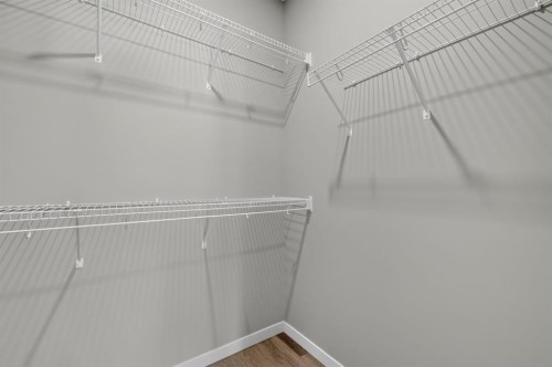 156 Belmont Boulevard Sw, Calgary, AB - Indoor With Storage