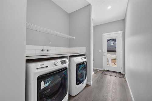 156 Belmont Boulevard Sw, Calgary, AB - Indoor Photo Showing Laundry Room