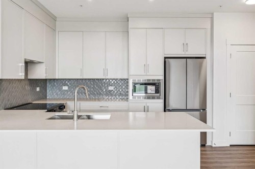 3303-3700 Seton Avenue Se, Calgary, AB - Indoor Photo Showing Kitchen With Double Sink With Upgraded Kitchen