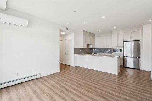 3303-3700 Seton Avenue Se, Calgary, AB - Indoor Photo Showing Kitchen With Double Sink With Upgraded Kitchen