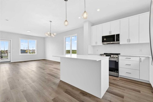 6 Hotchkiss Parade Se, Calgary, AB - Indoor Photo Showing Kitchen With Upgraded Kitchen