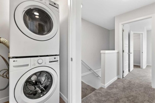 6 Hotchkiss Parade Se, Calgary, AB - Indoor Photo Showing Laundry Room