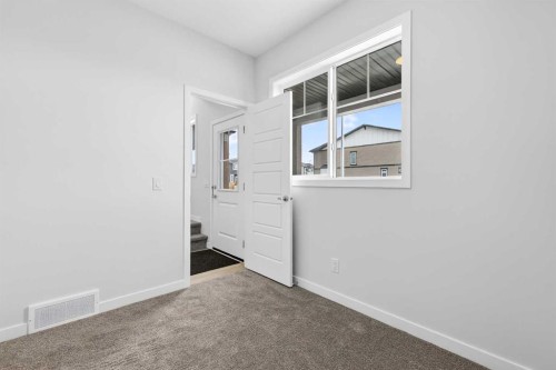 6 Hotchkiss Parade Se, Calgary, AB - Indoor Photo Showing Other Room