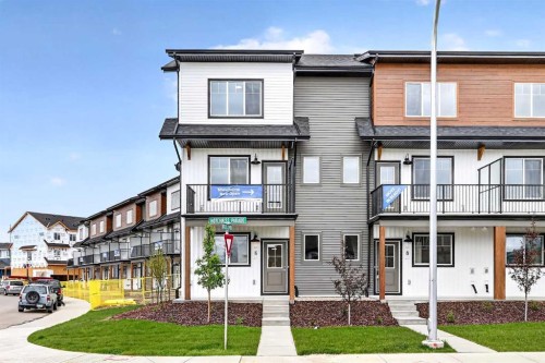 6 Hotchkiss Parade Se, Calgary, AB - Outdoor With Balcony With Facade