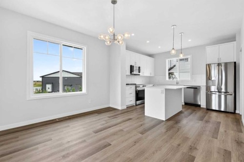 6 Hotchkiss Parade Se, Calgary, AB - Indoor Photo Showing Kitchen With Stainless Steel Kitchen With Upgraded Kitchen