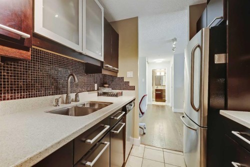 708-718 12 Avenue Sw, Calgary, AB - Indoor Photo Showing Kitchen With Stainless Steel Kitchen With Double Sink With Upgraded Kitchen