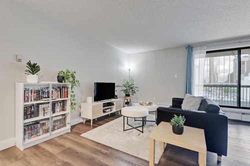 708-718 12 Avenue Sw, Calgary, AB - Indoor Photo Showing Living Room
