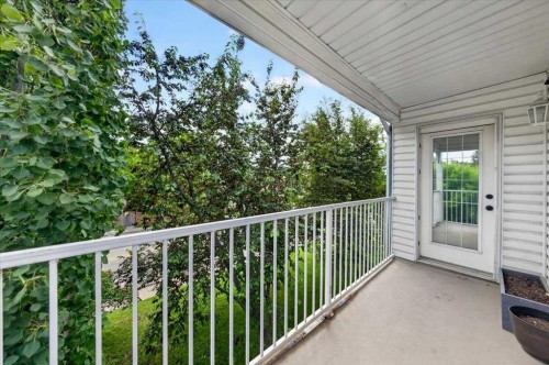 202-6148 Bowness Road Nw, Calgary, AB - Outdoor With Balcony With Exterior