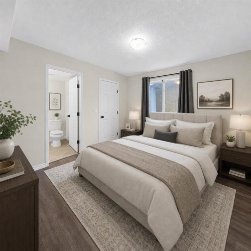 202-6148 Bowness Road Nw, Calgary, AB - Indoor Photo Showing Bedroom