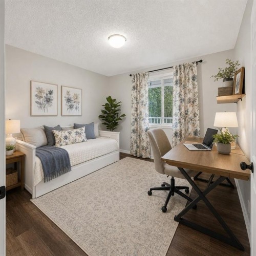 202-6148 Bowness Road Nw, Calgary, AB - Indoor Photo Showing Bedroom