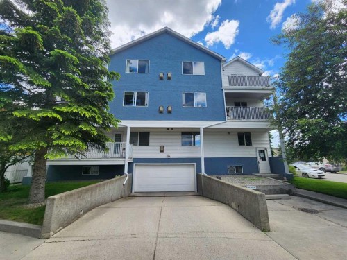 202-6148 Bowness Road Nw, Calgary, AB - Outdoor With Balcony
