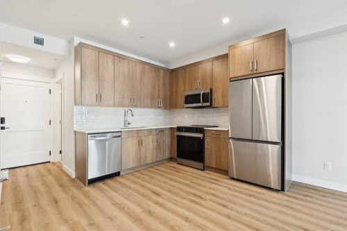 6103-1802 Mahogany Boulevard Se, Calgary, AB - Indoor Photo Showing Kitchen