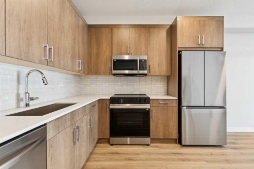 6103-1802 Mahogany Boulevard Se, Calgary, AB - Indoor Photo Showing Kitchen With Upgraded Kitchen