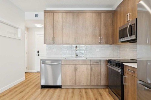 6103-1802 Mahogany Boulevard Se, Calgary, AB - Indoor Photo Showing Kitchen With Upgraded Kitchen
