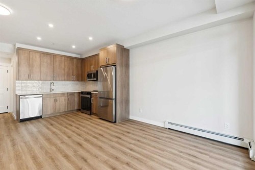 6103-1802 Mahogany Boulevard Se, Calgary, AB - Indoor Photo Showing Kitchen