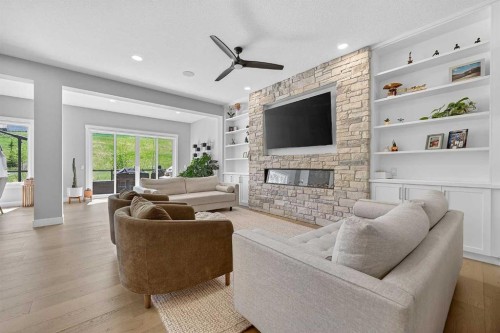 125 Hampstead Mews Nw, Calgary, AB - Indoor Photo Showing Living Room With Fireplace