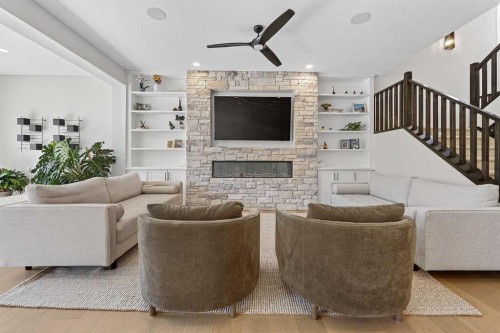 125 Hampstead Mews Nw, Calgary, AB - Indoor Photo Showing Living Room With Fireplace