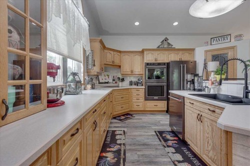 29104 Highway 27, Rural Mountain View County, AB - Indoor Photo Showing Kitchen With Double Sink
