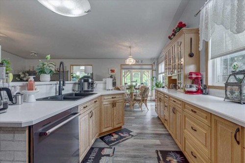 29104 Highway 27, Rural Mountain View County, AB - Indoor Photo Showing Kitchen With Double Sink