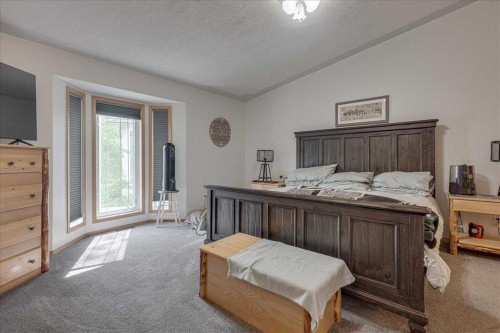 29104 Highway 27, Rural Mountain View County, AB - Indoor Photo Showing Bedroom
