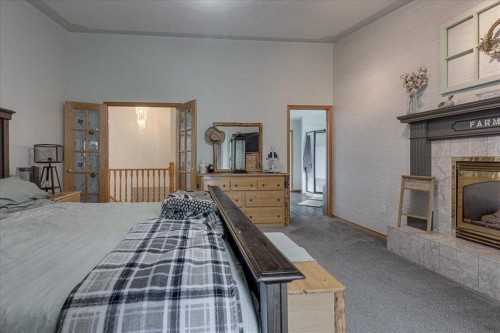 29104 Highway 27, Rural Mountain View County, AB - Indoor Photo Showing Bedroom