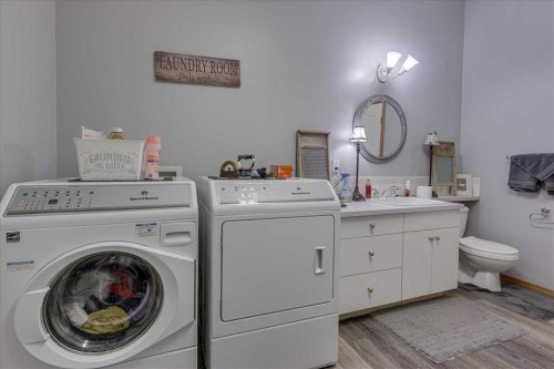 29104 Highway 27, Rural Mountain View County, AB - Indoor Photo Showing Laundry Room