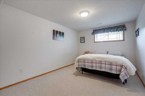 29104 Highway 27, Rural Mountain View County, AB - Indoor Photo Showing Bedroom
