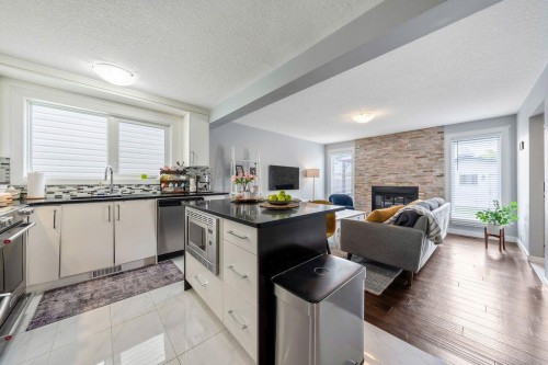 15 Woodmont Green Sw, Calgary, AB 