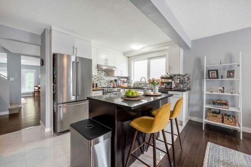 15 Woodmont Green Sw, Calgary, AB 