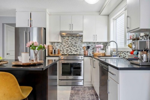 15 Woodmont Green Sw, Calgary, AB 